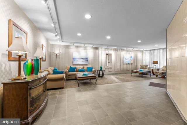 a living room with furniture and a table