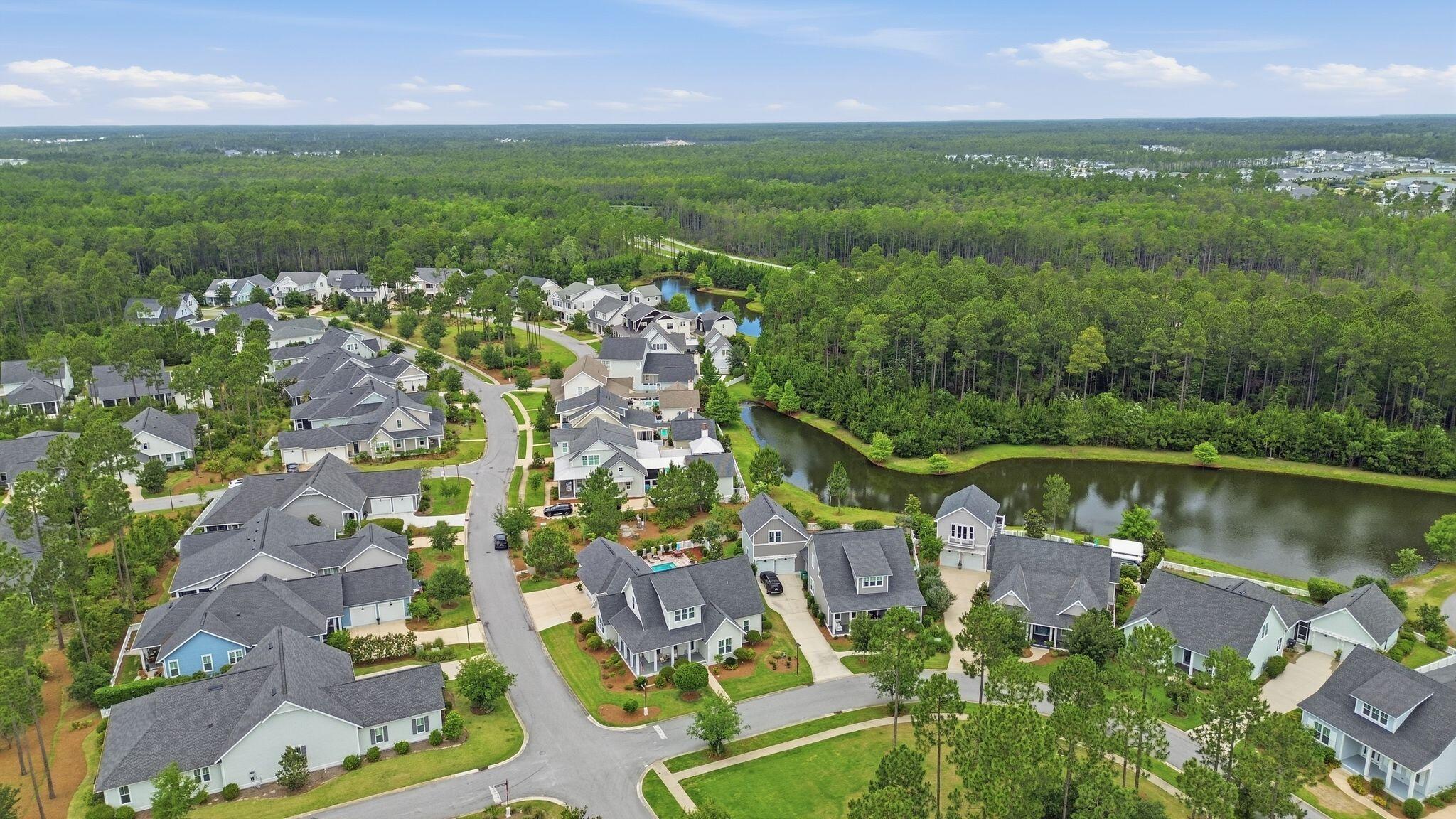 133 Sandchase Circle, Unit LOT 15 Inlet Beach, FL 32461 - Photo 38 of 47 a view of a lake with a city