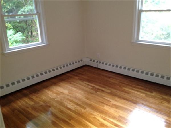 21 Howell Road Sudbury, MA 01776 - Photo 15 of 22 a view of a room with blue walls and window
