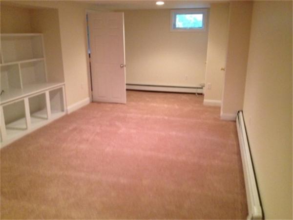 21 Howell Road Sudbury, MA 01776 - Photo 19 of 22 an empty room with windows