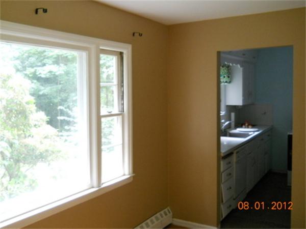 21 Howell Road Sudbury, MA 01776 - Photo 9 of 22 a bathroom with a sink a mirror and a window