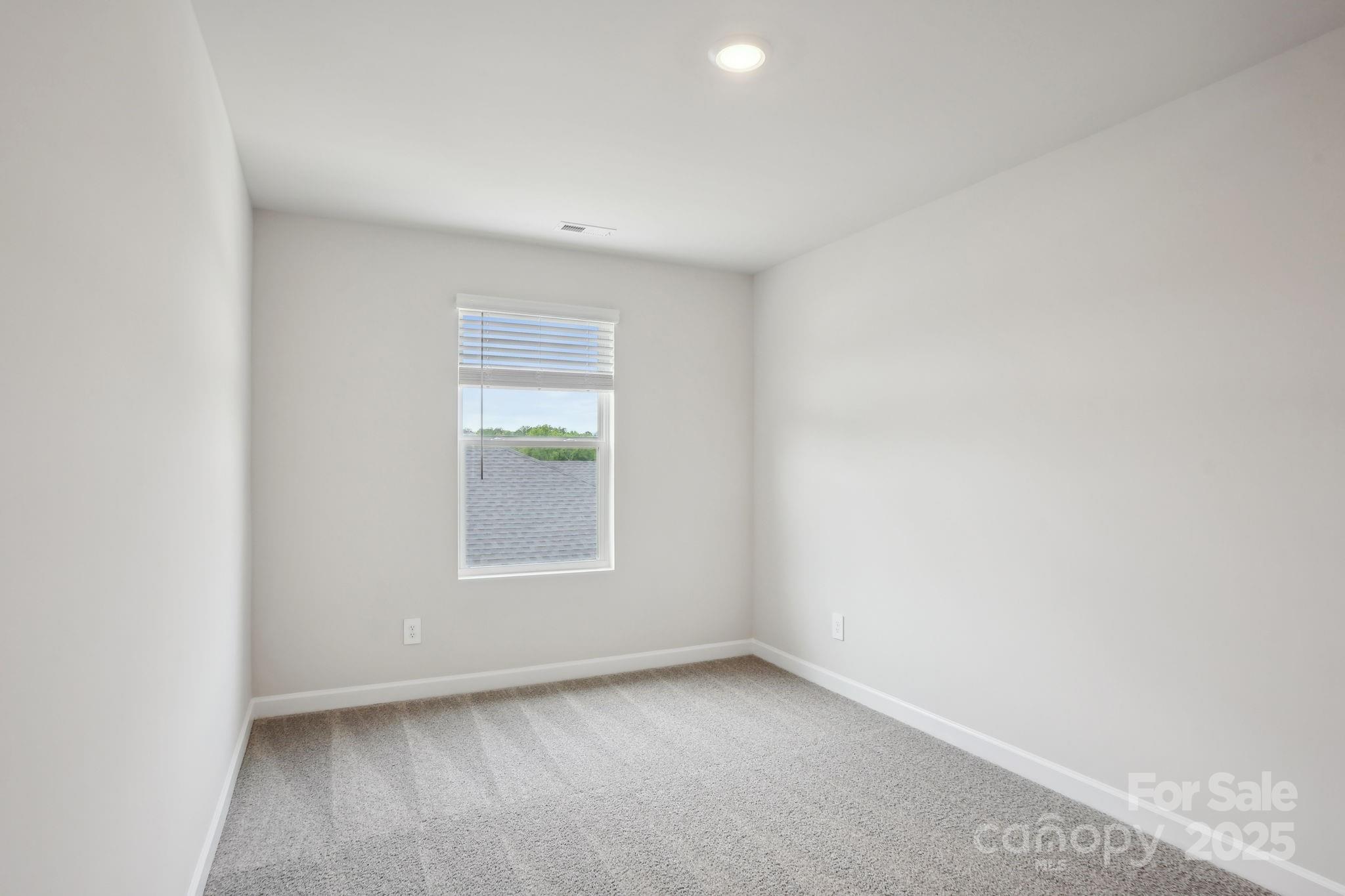 196 Murphy Mdw Road Mocksville, NC 27028 - Photo 13 of 24 a view of an empty room with a window