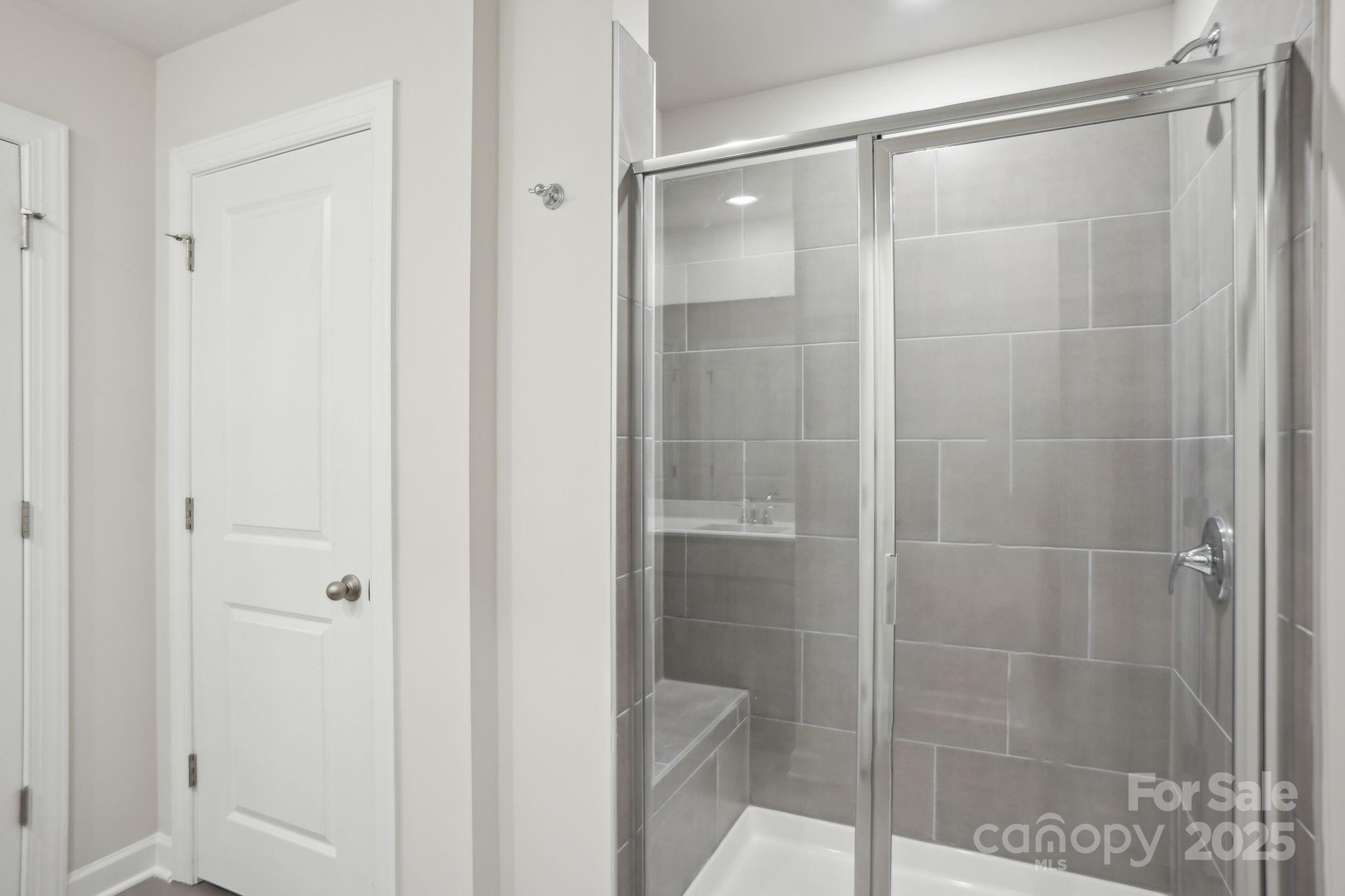 196 Murphy Mdw Road Mocksville, NC 27028 - Photo 19 of 24 a bathroom with a glass shower door