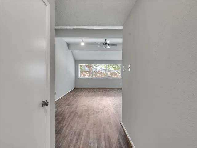 a view of an empty room and window