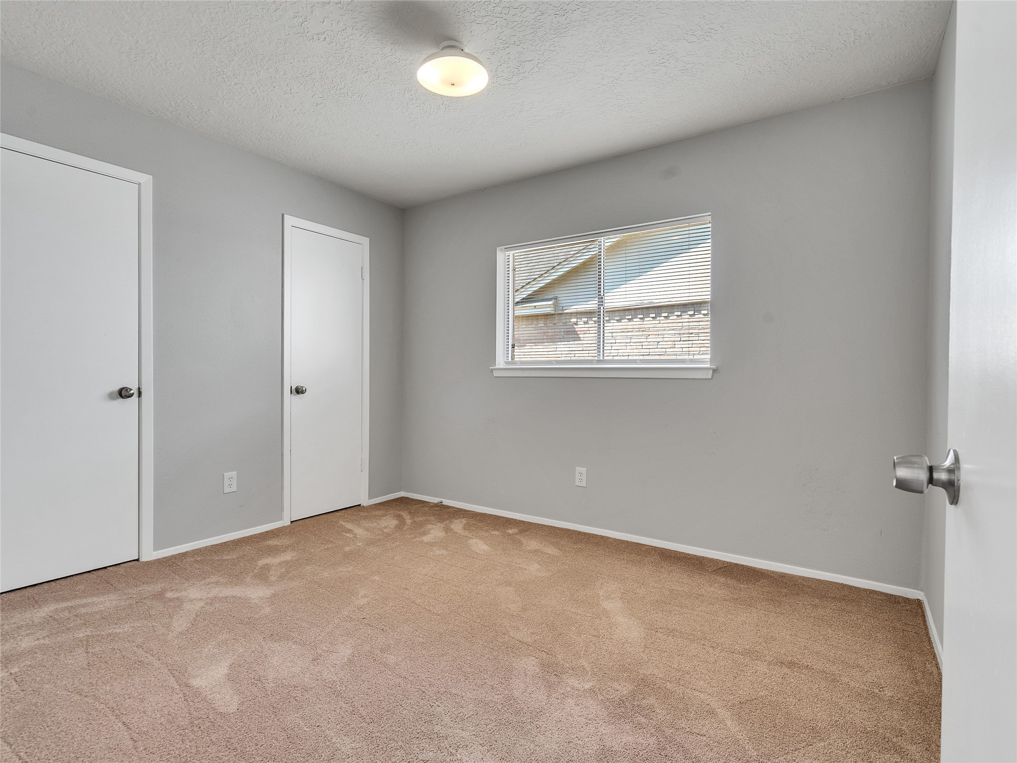 24006 Spring Gum Drive Spring, TX 77373 - Photo 22 of 31 an empty room with windows