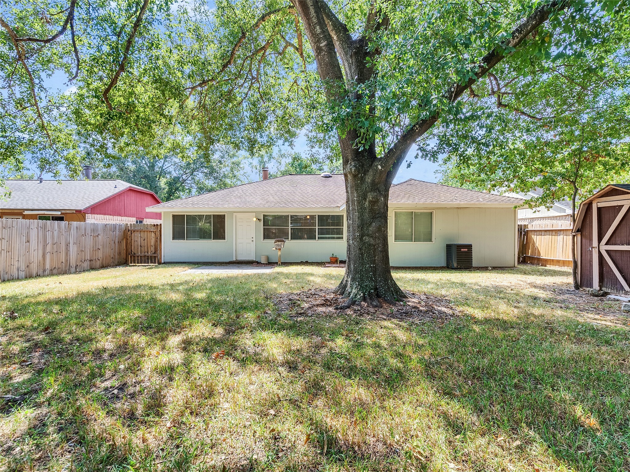 24006 Spring Gum Drive Spring, TX 77373 - Photo 25 of 31 a front view of house with yard and green space
