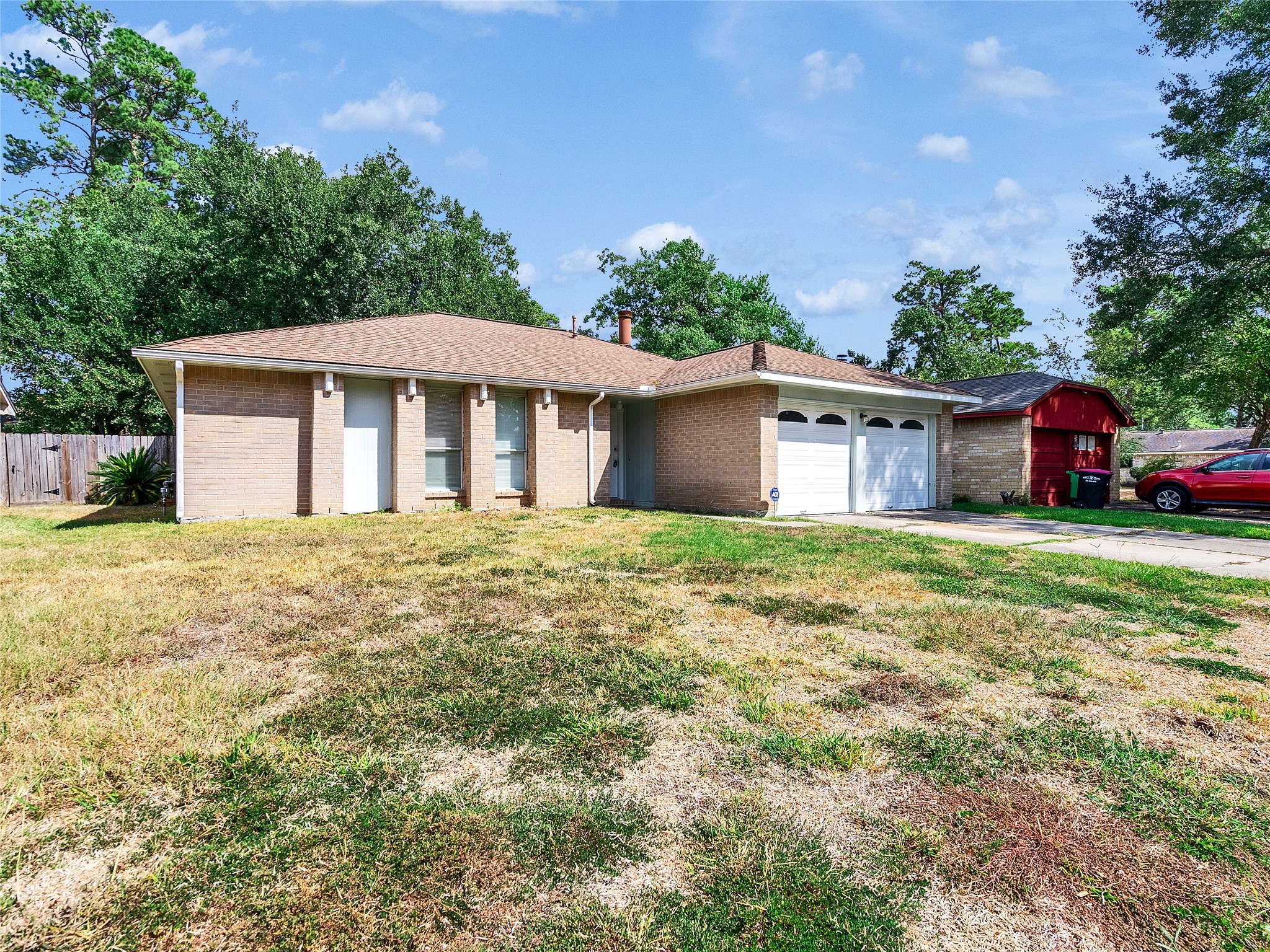 24006 Spring Gum Drive Spring, TX 77373 - Photo 27 of 31 a front view of a house with garden