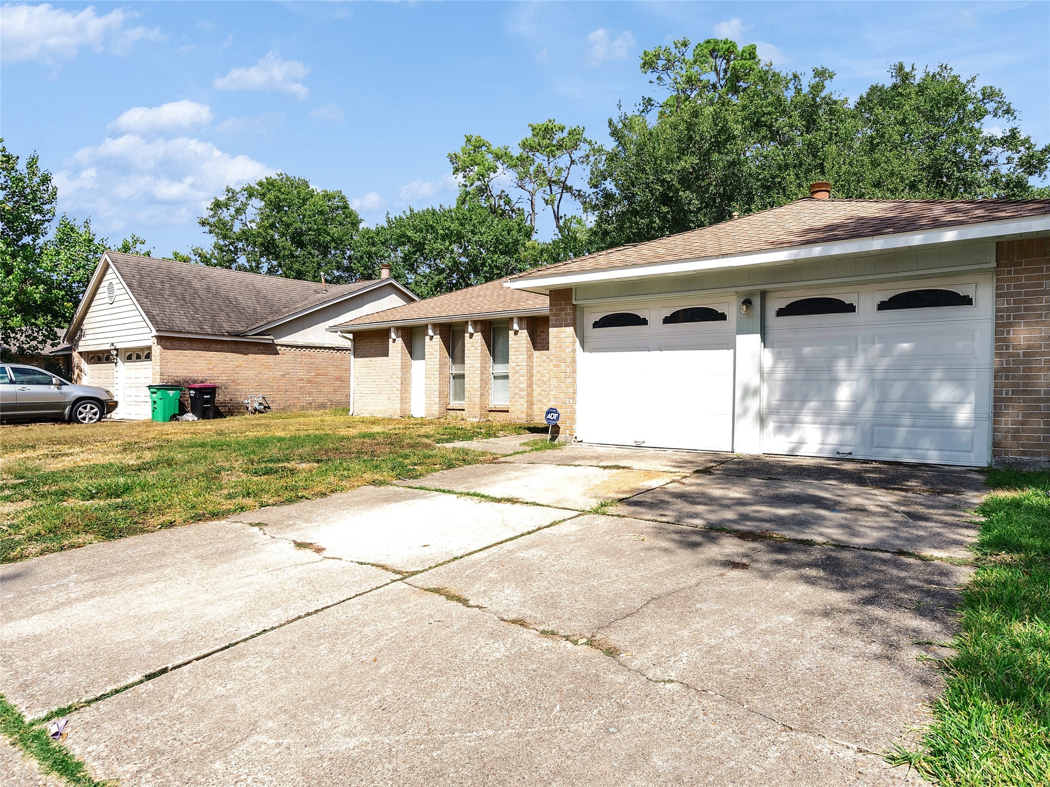 24006 Spring Gum Drive Spring, TX 77373 - Photo 28 of 31 a front view of a house with a yard and garage