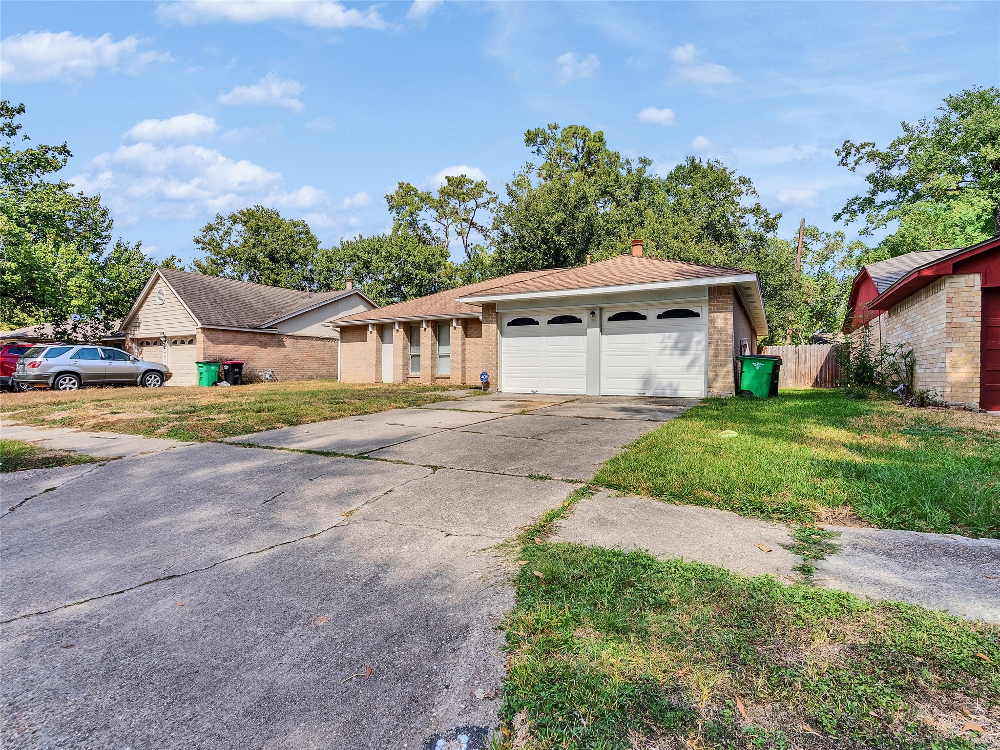 24006 Spring Gum Drive Spring, TX 77373 - Photo 30 of 31 a front view of a house with garden