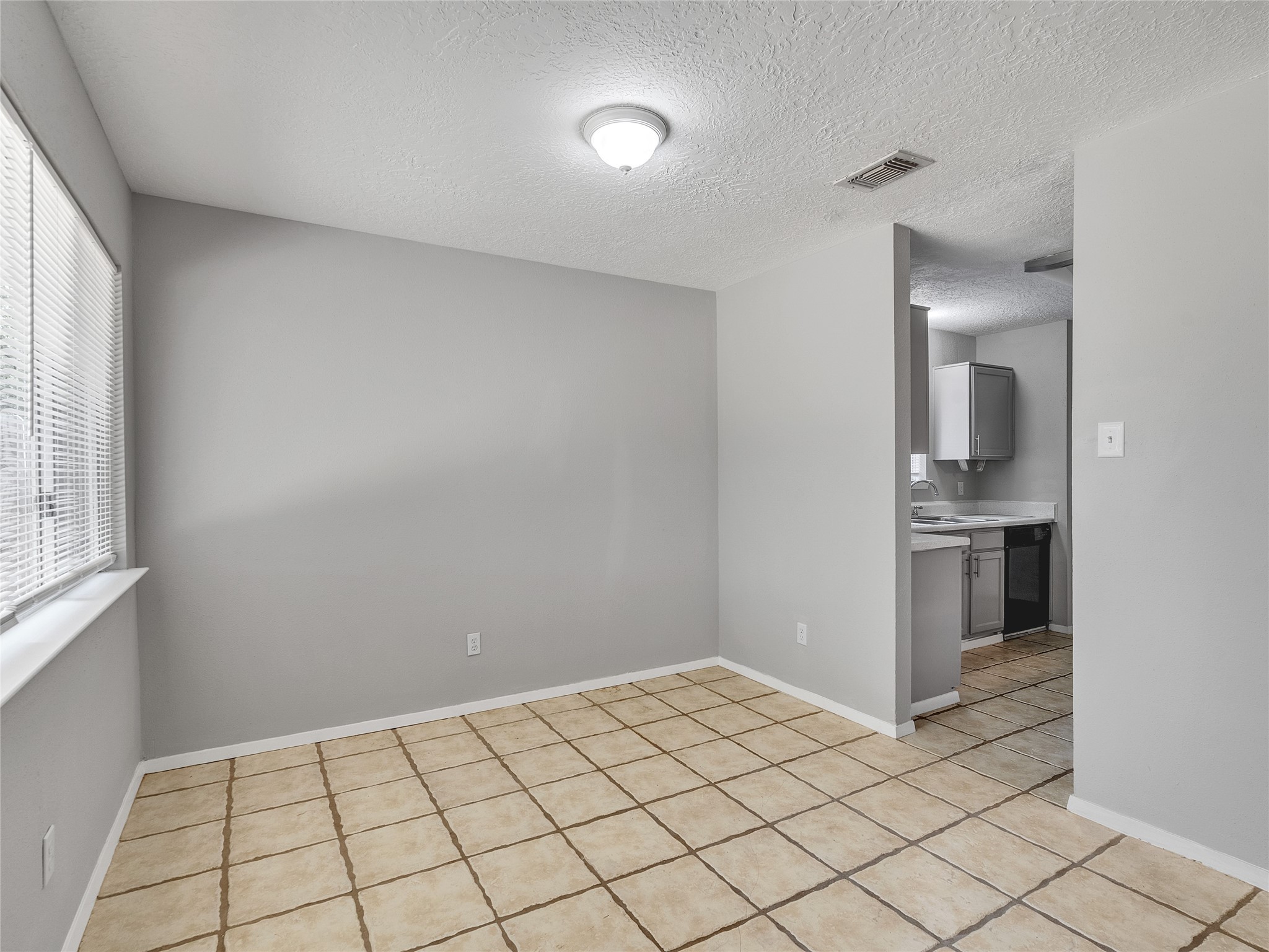 24006 Spring Gum Drive Spring, TX 77373 - Photo 8 of 31 a view of an empty room and window