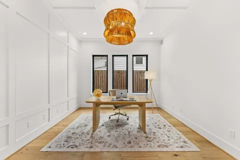 wooden floor with a rug