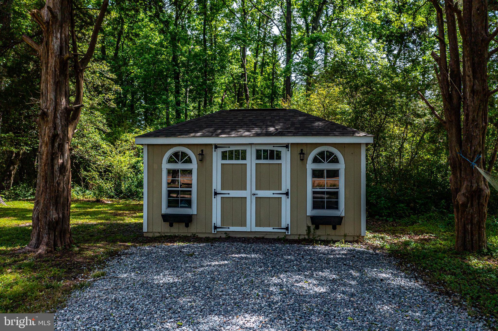 76 Tucker Hill Road Kinsale, VA 22488 - Photo 21 of 43 a front view of a house with a garden