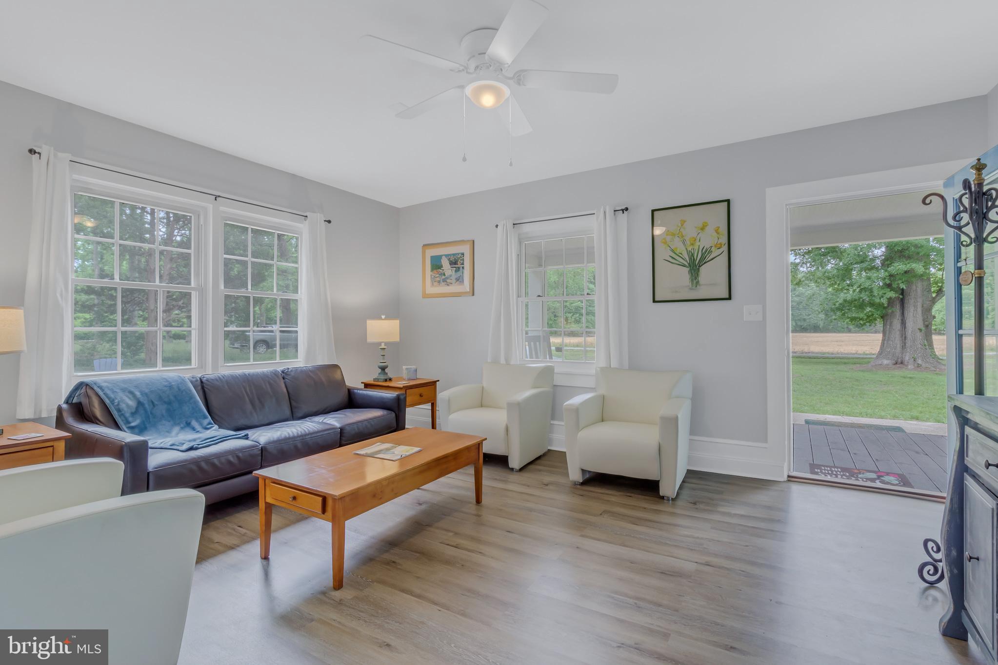 76 Tucker Hill Road Kinsale, VA 22488 - Photo 23 of 43 a living room with furniture and a large window