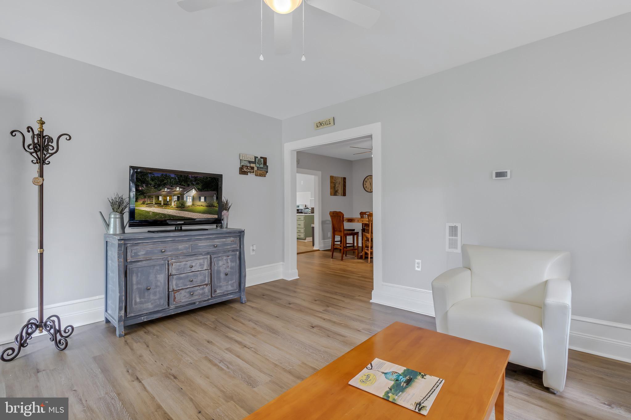 76 Tucker Hill Road Kinsale, VA 22488 - Photo 24 of 43 a living room with furniture and a flat screen tv