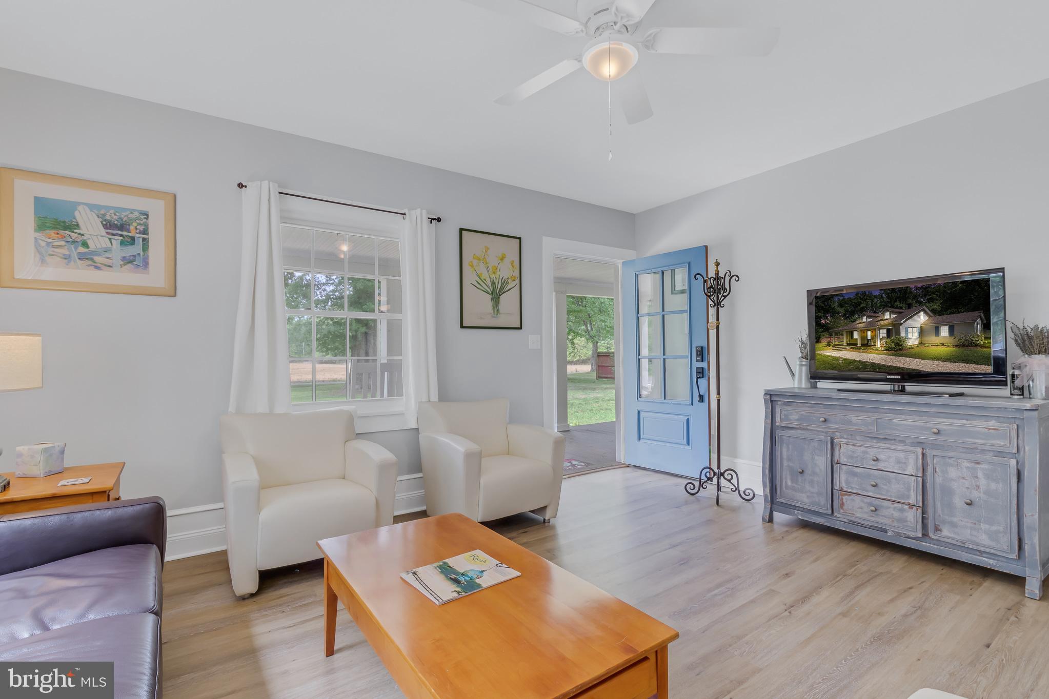 76 Tucker Hill Road Kinsale, VA 22488 - Photo 25 of 43 a living room with furniture and a flat screen tv