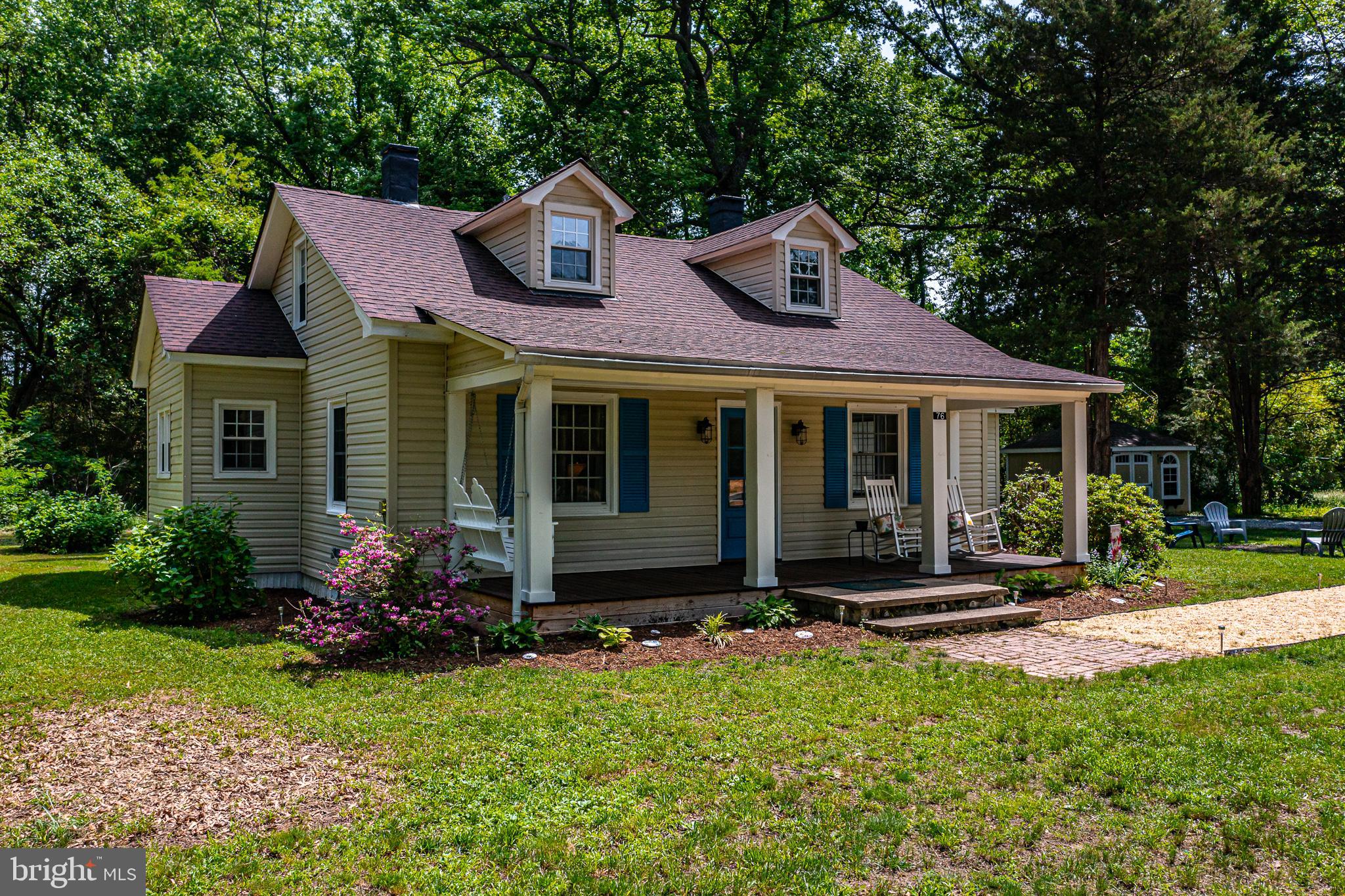 76 Tucker Hill Road Kinsale, VA 22488 - Photo 3 of 43 a front view of a house with garden