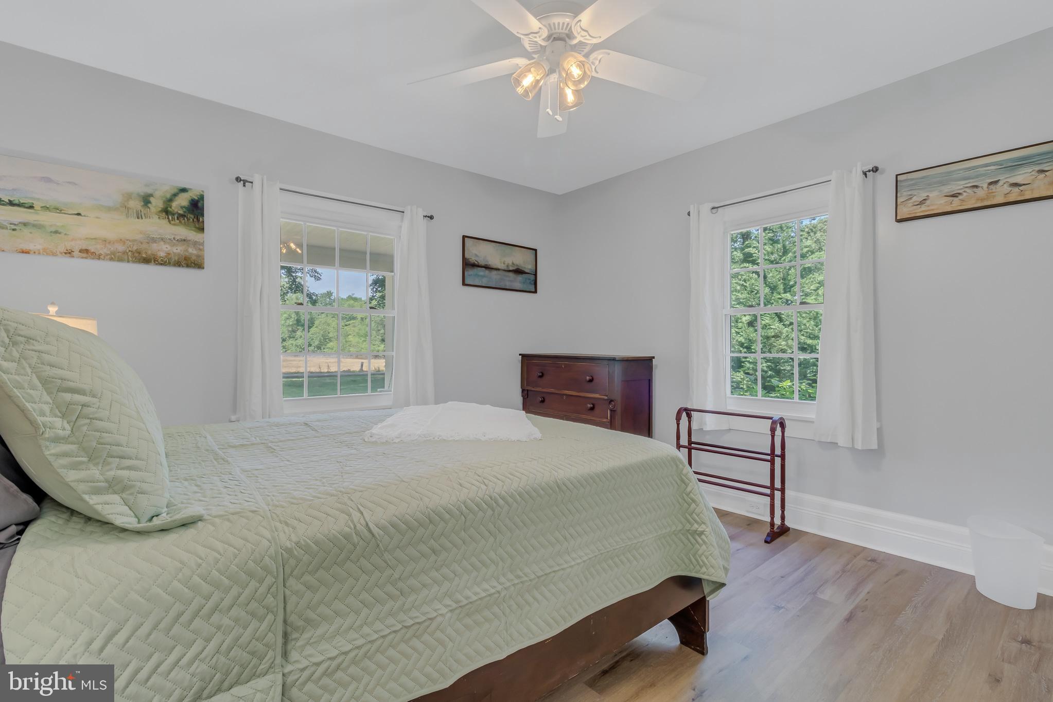 76 Tucker Hill Road Kinsale, VA 22488 - Photo 32 of 43 a bedroom with a bed and a window