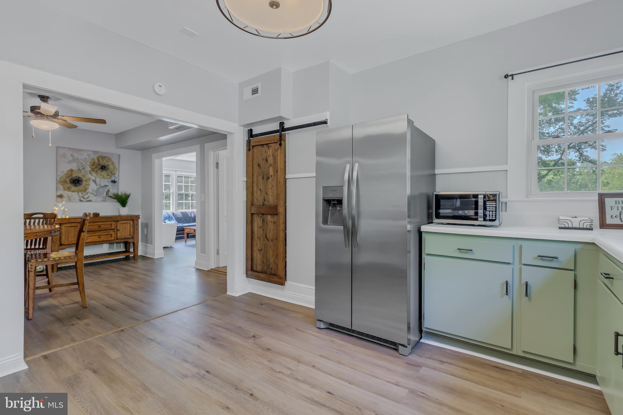 76 Tucker Hill Road Kinsale, VA 22488 - Photo 37 of 43 a kitchen with stainless steel appliances granite countertop a refrigerator and a sink