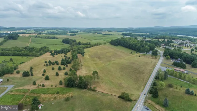an aerial view of a houses with outdoor space