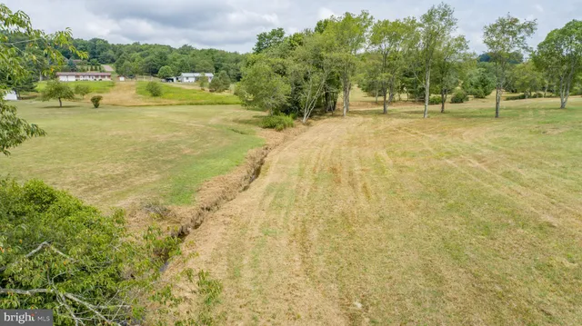 a view of an outdoor space and swimming pool
