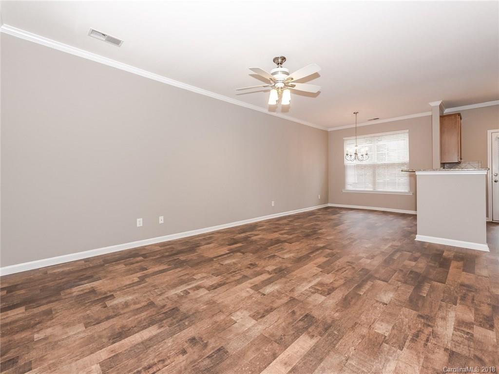 2123 Midnight Blue Lane, Unit 191 Fort Mill, SC 29708 - Photo 3 of 34 a view of empty room with window and ceiling fan