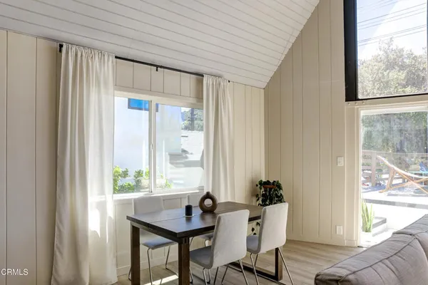 a workspace with furniture and a window