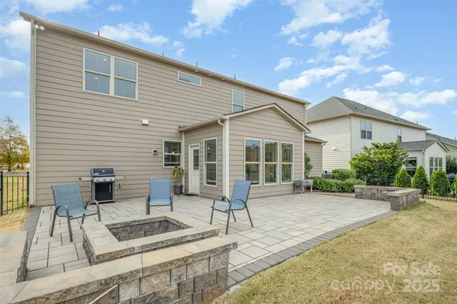 a front view of a house with patio