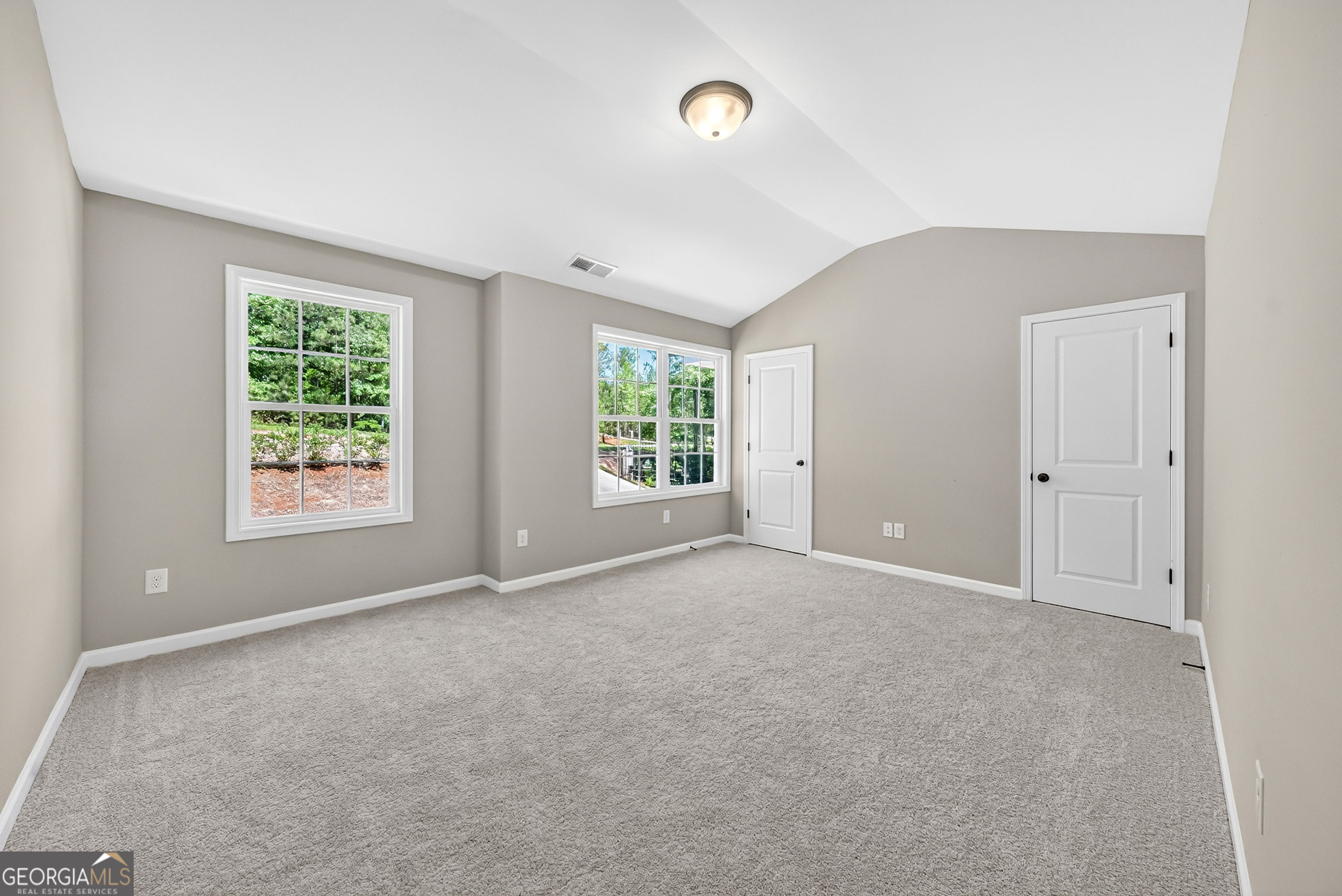 38 Oak Ridge Drive, Unit 26 Waverly Hall, GA 31831 - Photo 29 of 37 a view of an empty room with a window