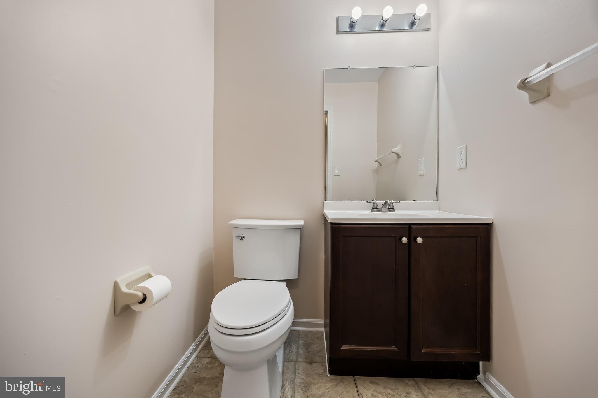 6206 Preston Way Mount Laurel, NJ 08054 - Photo 13 of 30 a bathroom with a toilet a sink and mirror