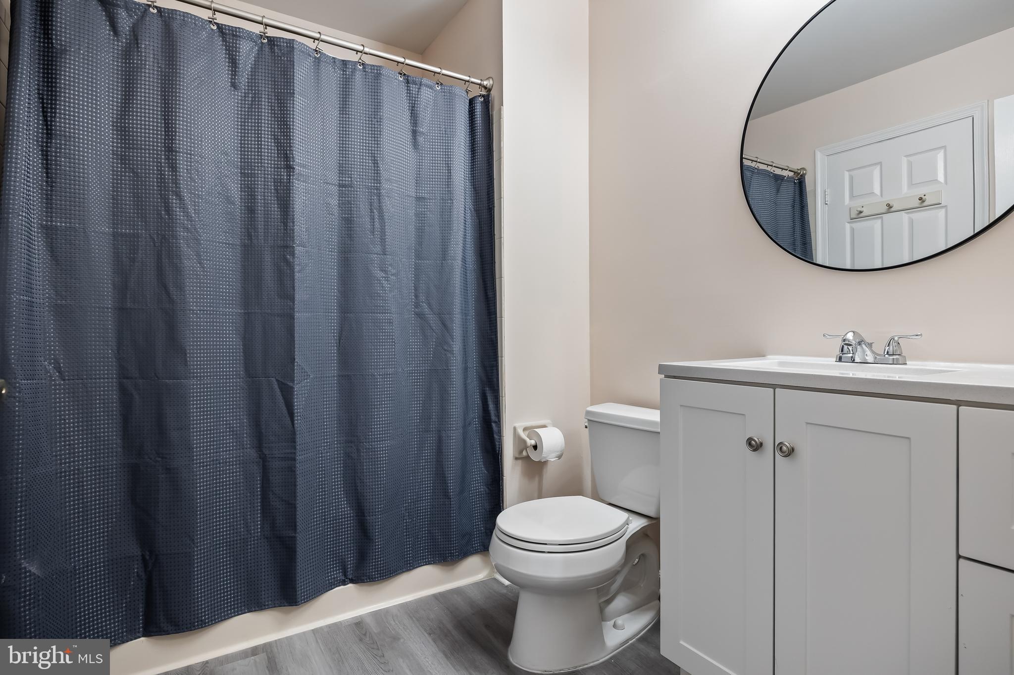 6206 Preston Way Mount Laurel, NJ 08054 - Photo 17 of 30 a bathroom with a toilet a sink and a mirror