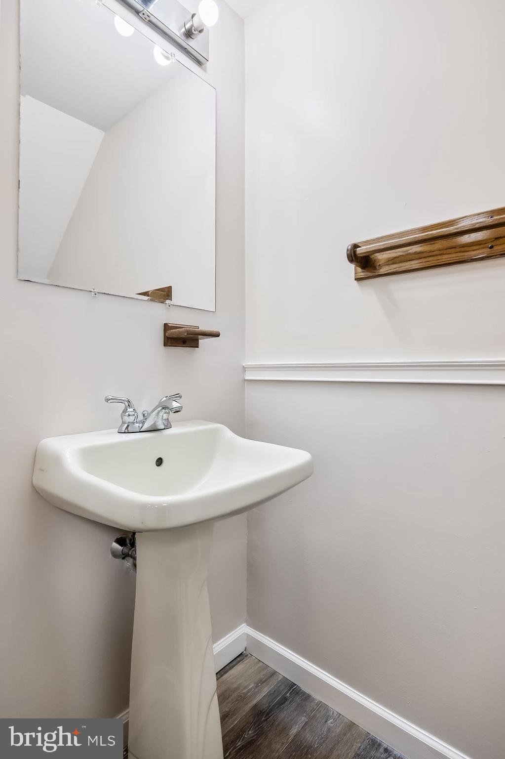 6206 Preston Way Mount Laurel, NJ 08054 - Photo 29 of 30 a bathroom with a sink and mirror
