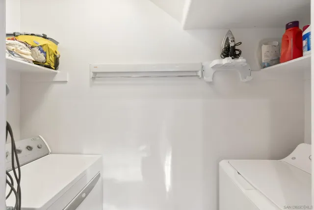 a bathroom with a sink and vanity