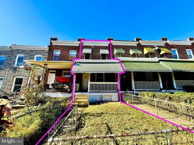 a store with buildings and outdoor seating