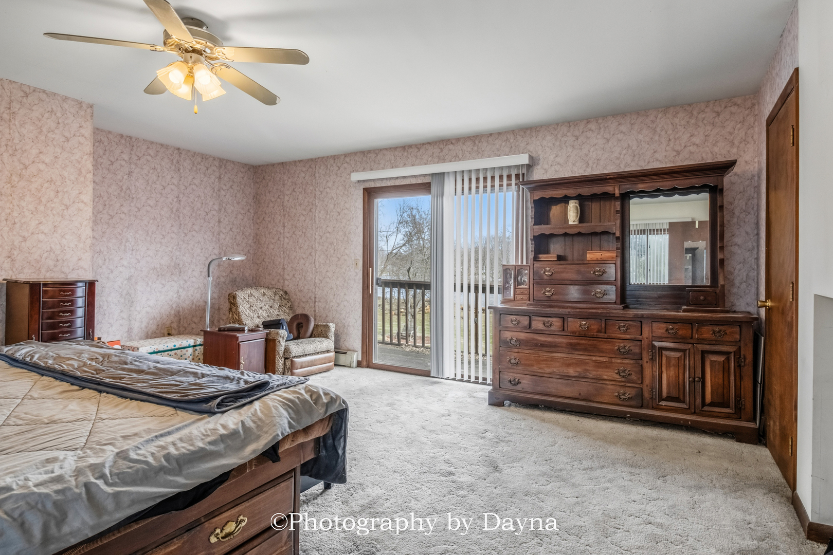 2857 River Road Kankakee, IL 60901 - Photo 13 of 35 a bedroom with a bed and a chandelier