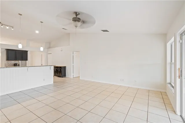 a view of an empty room and window