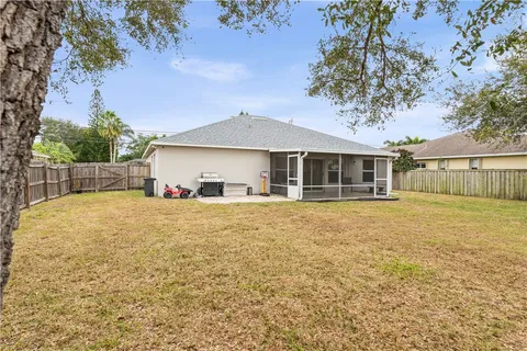 a view of backyard with green space