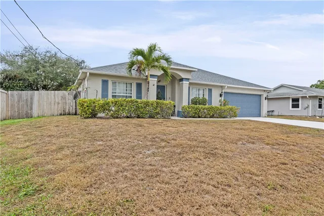 front view of house with a yard