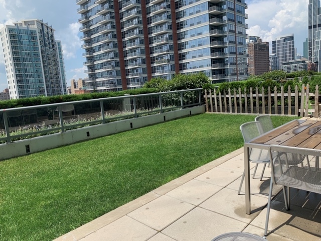 1629 South Prairie Avenue, Unit 708 Chicago, IL 60616 - Photo 2 of 7 a view of a building from a yard