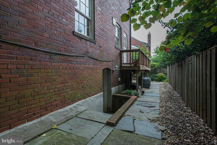 4625 Sedgwick Street Northwest Washington, DC 20016 - Photo 18 of 19 a view of pathway along with brick wall