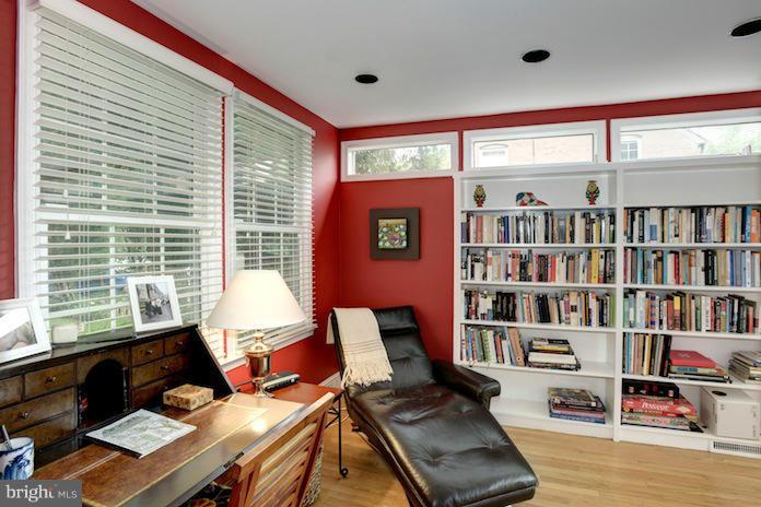 4625 Sedgwick Street Northwest Washington, DC 20016 - Photo 7 of 19 a living room with furniture and a book shelf