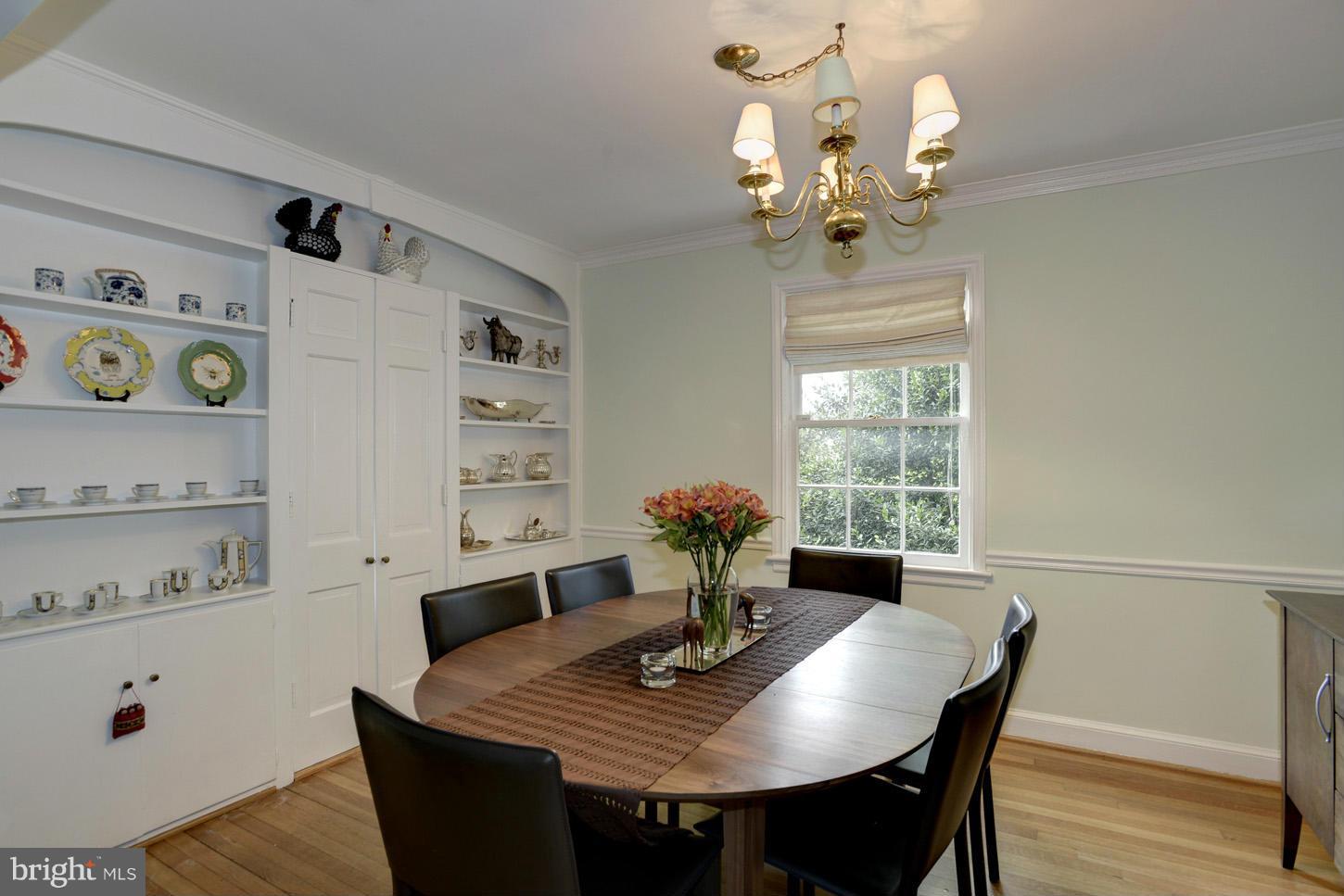 4625 Sedgwick Street Northwest Washington, DC 20016 - Photo 10 of 19 a view of a dining room with furniture and wooden floor