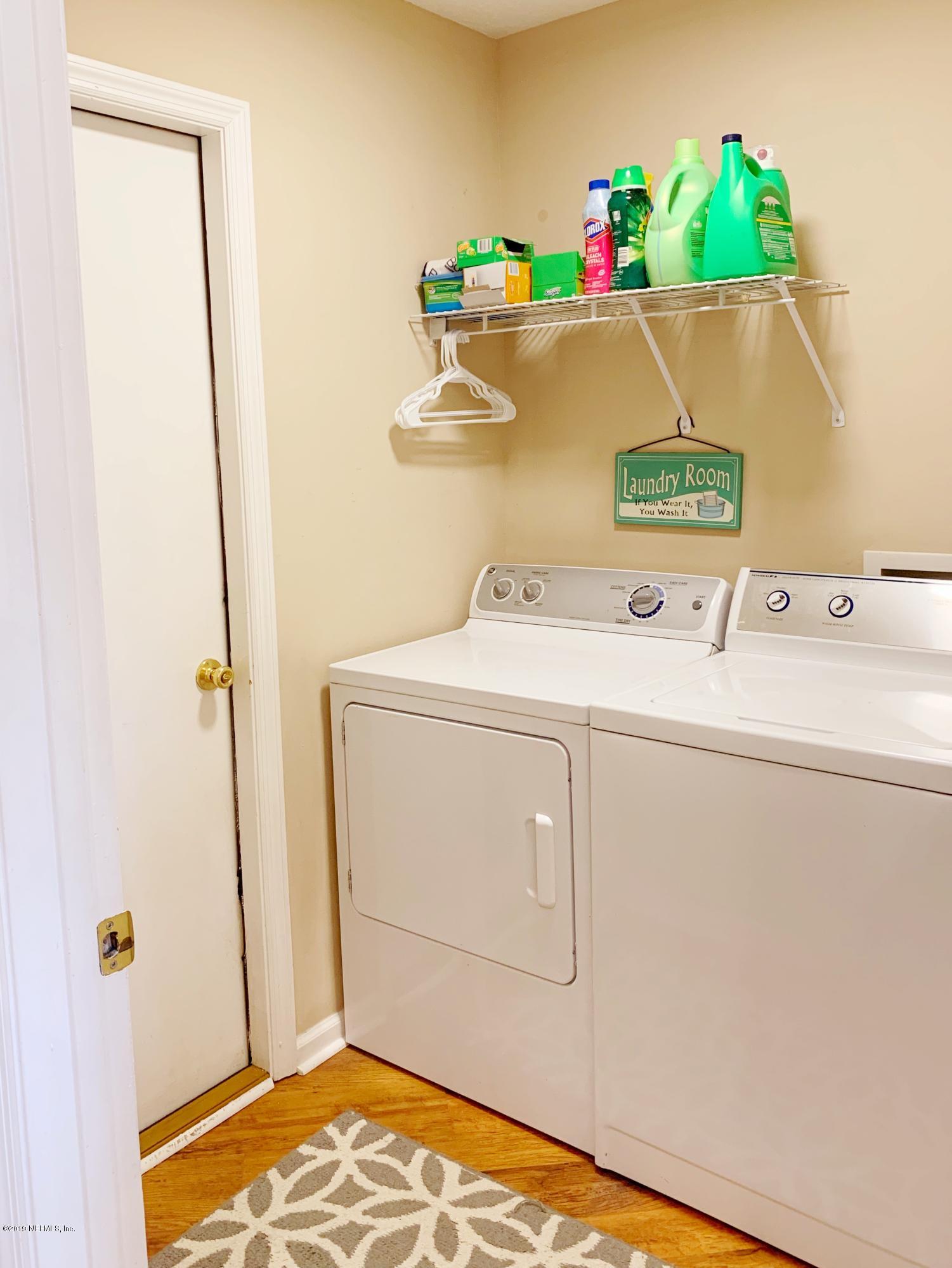 10345 Sugar Grove Road Jacksonville, FL 32221 - Photo 36 of 36 a utility room with dryer and washer