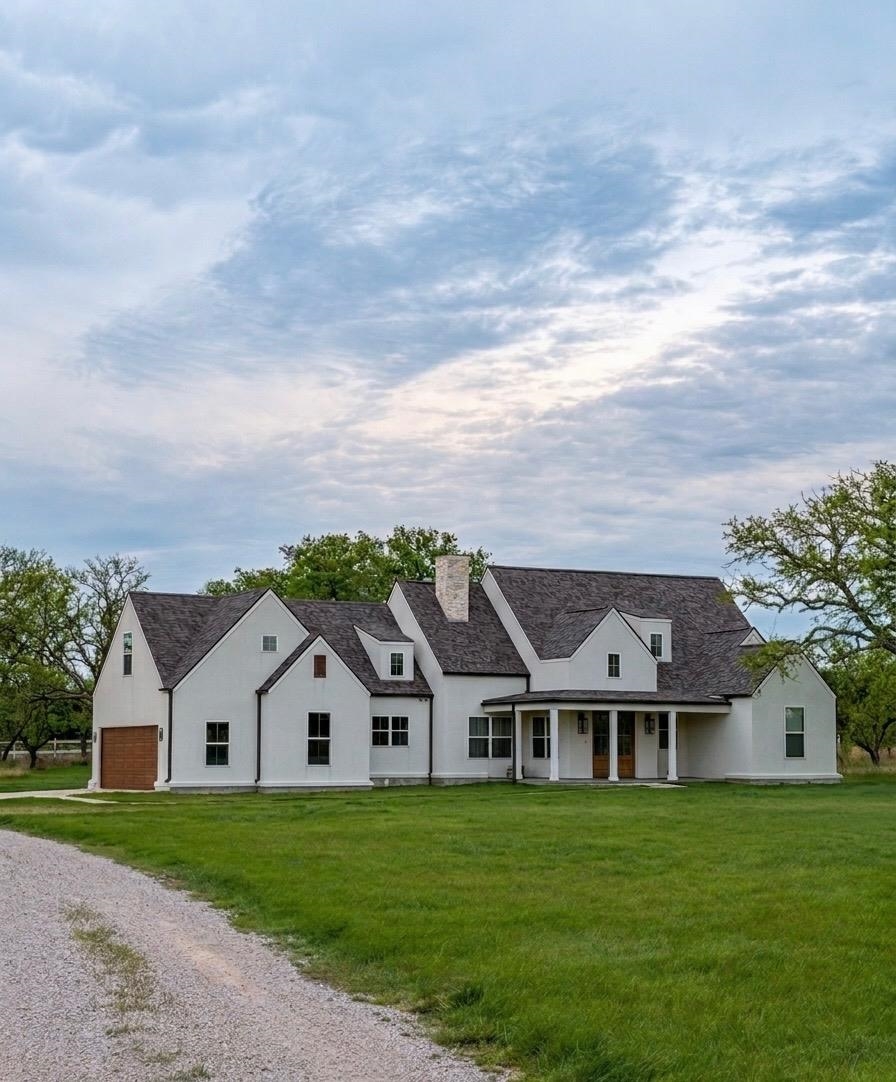 front view of a house with a yard