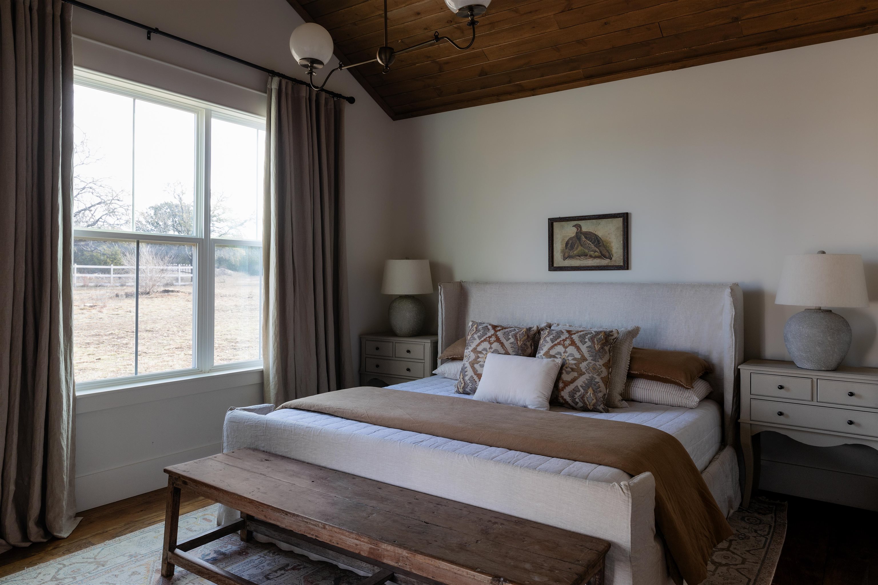 167 Sable Pass Lampasas, TX 76550 - Photo 12 of 30 a bedroom with a bed a dresser next to a window