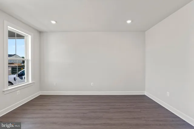 a metallic refrigerator freezer and a stove top oven