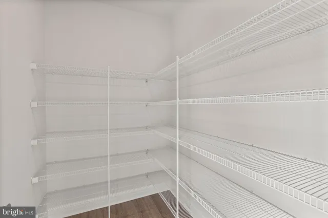 a bathroom with a toilet a sink and a shower