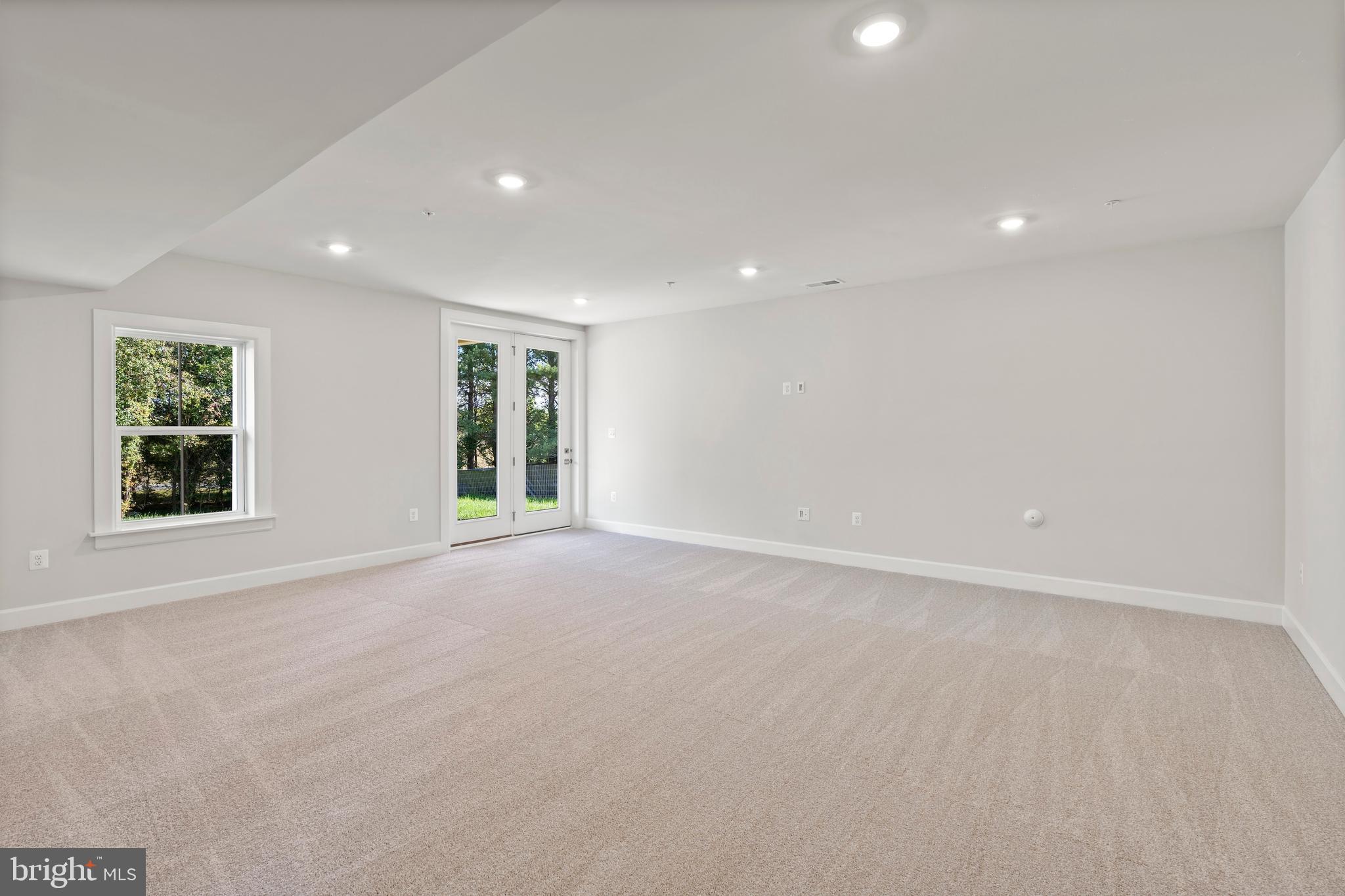 1448 Lavender Cliff Way Odenton, MD 21113 - Photo 44 of 94 a view of an empty room with a window