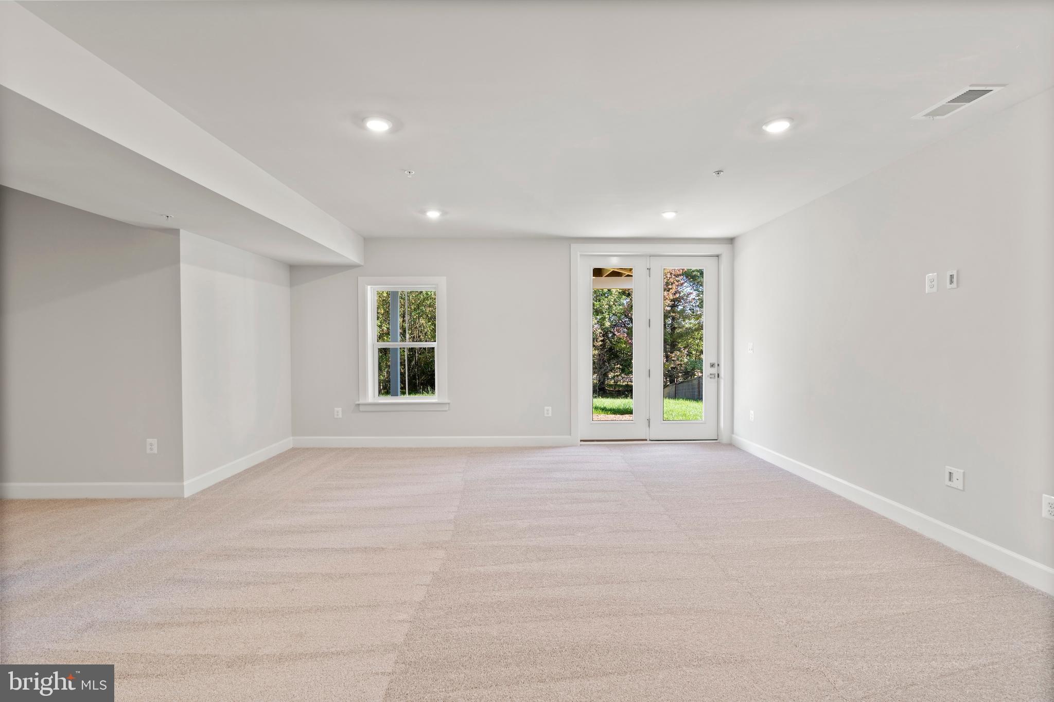 1448 Lavender Cliff Way Odenton, MD 21113 - Photo 45 of 94 a view of an empty room with a window