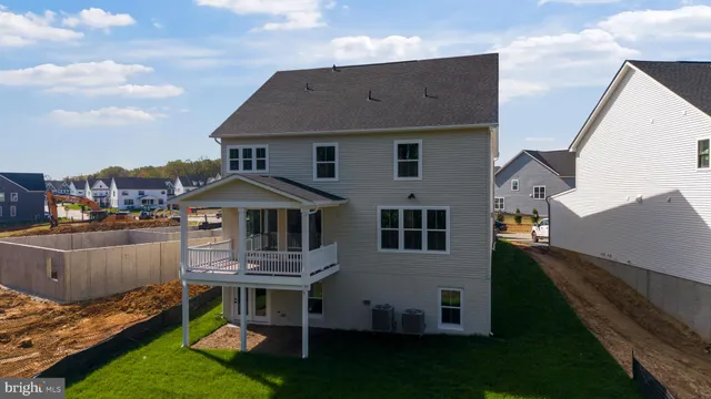 a view of a building with a yard