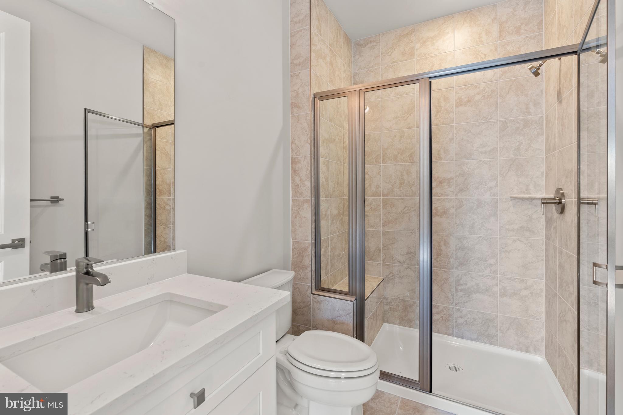 1448 Lavender Cliff Way Odenton, MD 21113 - Photo 70 of 94 a bathroom with a sink and a mirror